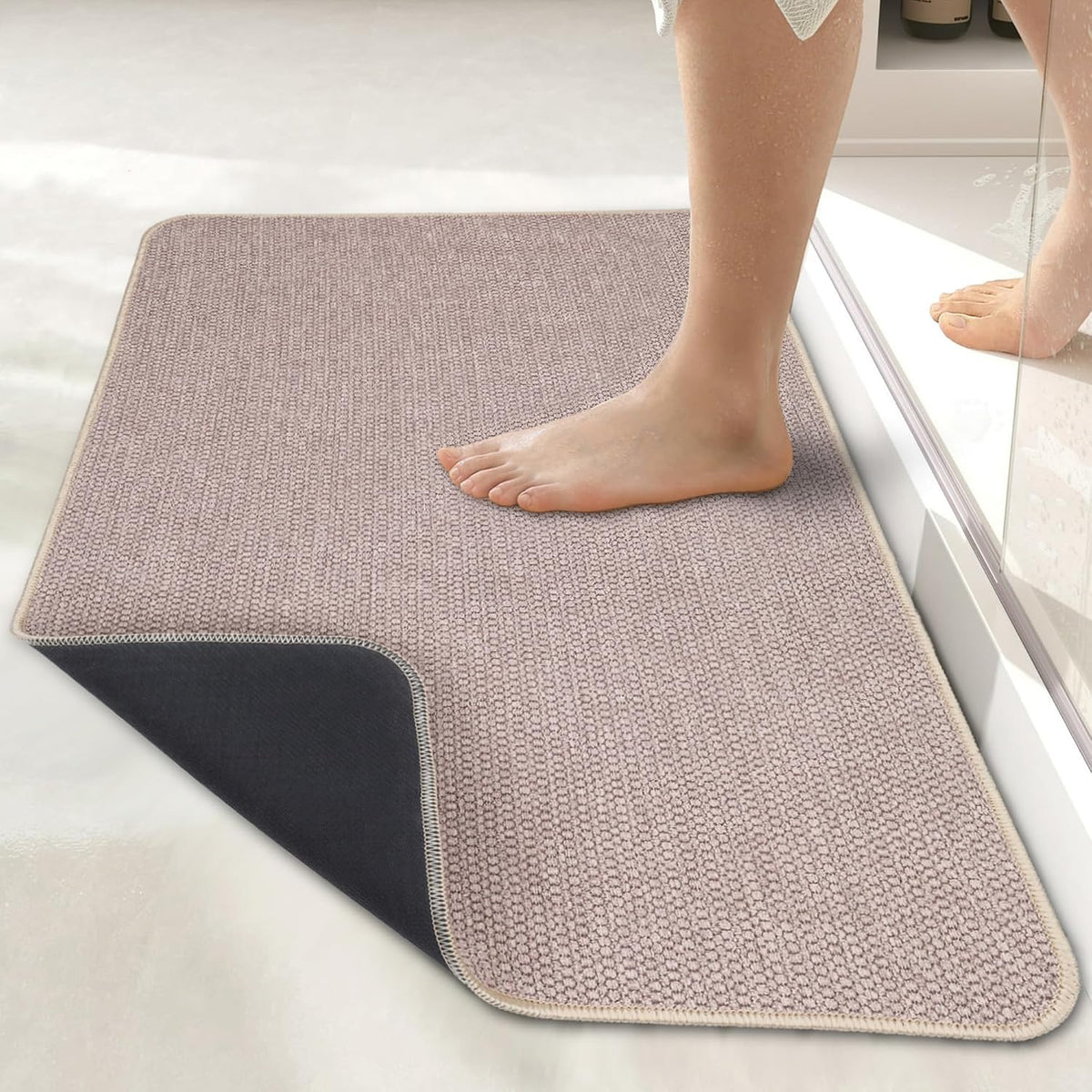 Beige textured bathroom floor mat